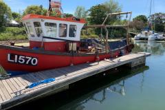 1594812243-fishing-boat