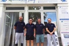 1599909634-boys-outside-shop
